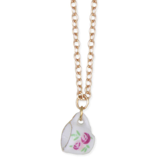 Pink and white ceramic teacup gold necklace tea jewelry Necklace with a teardrop-shaped pendant featuring floral design on a white background