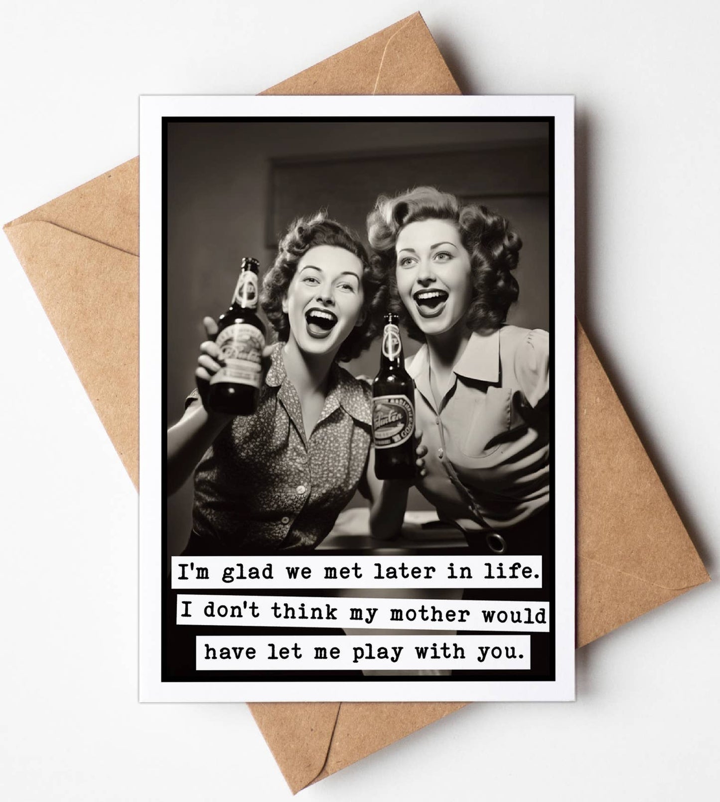 Vintage-style greeting card with two women holding beer bottles and humorous text on a brown envelope.